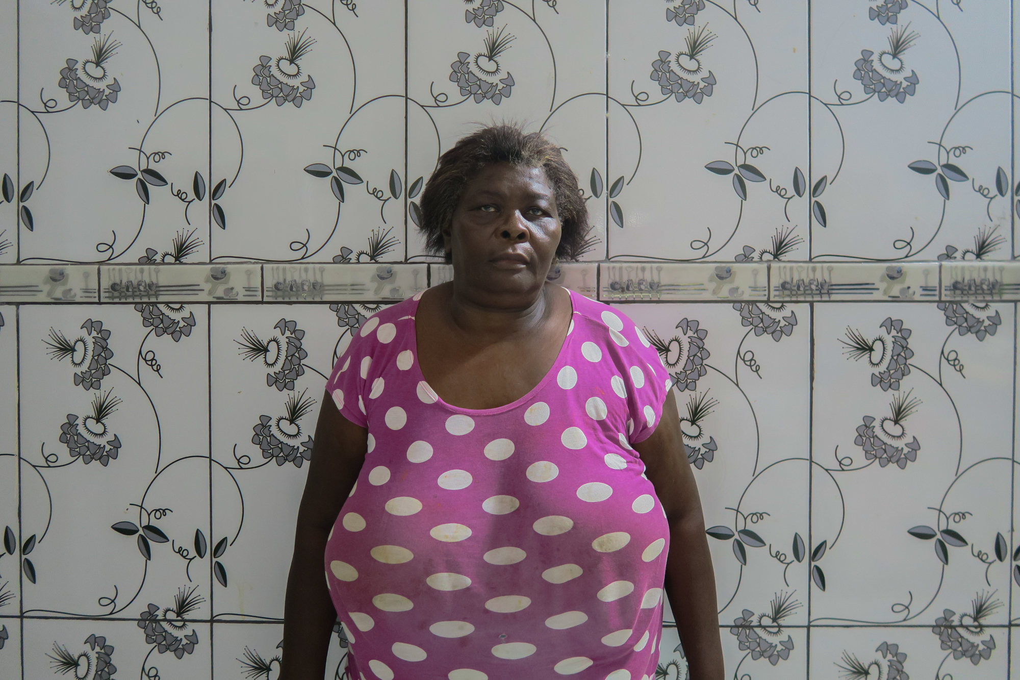 The lady in the pink t-shirt with white polka dots, Pindaré-Mirim